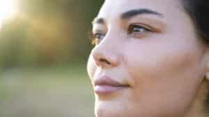 Woman in her 50s looks younger than her age thanks to eyelid surgery.