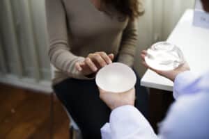 Woman considering breast implant options